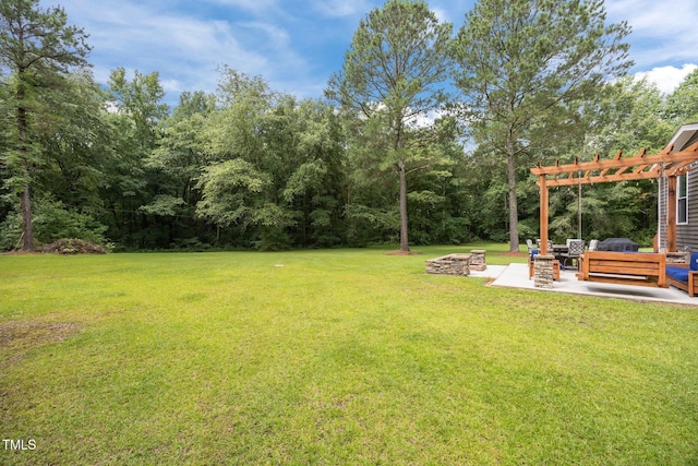 1128 Old Stage Rd S, Erwin, NC 28339 - view of green lawn featuring a pergola, a patio area, and an outdoor living space with a fire pit