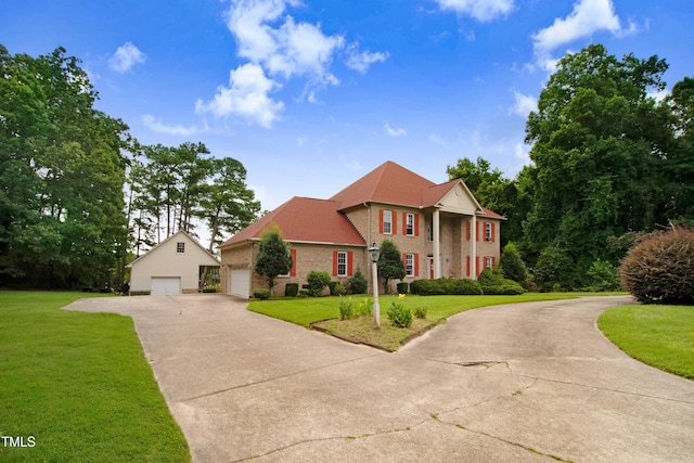 4904 Pebble Beach Cir N, Wilson, NC 27896 - greek revival inspired property with brick siding, a front yard, and driveway