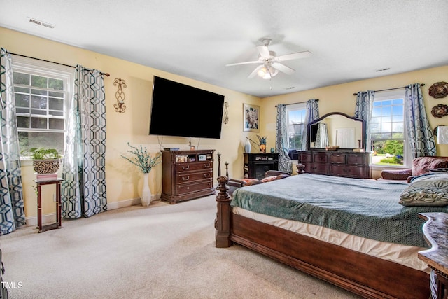 4904 Pebble Beach Cir N, Wilson, NC 27896 - carpeted bedroom with baseboards and ceiling fan