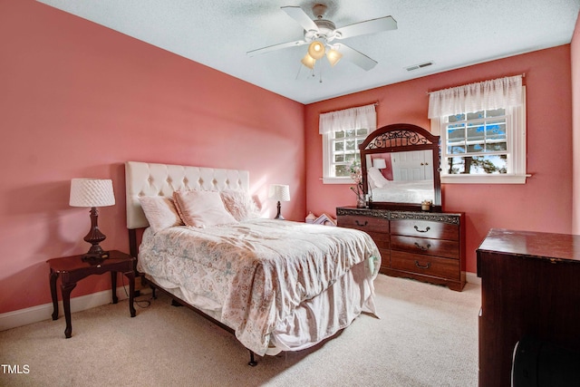 4904 Pebble Beach Cir N, Wilson, NC 27896 - bedroom featuring light carpet and a ceiling fan
