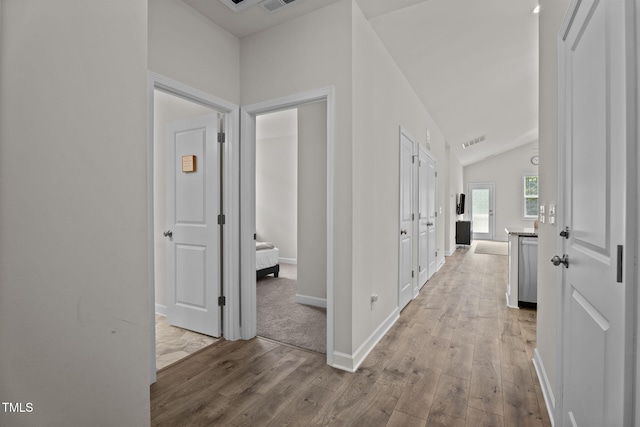 312 E Yukon St, Kenly, NC 27542 - hall with light wood-style floors and lofted ceiling
