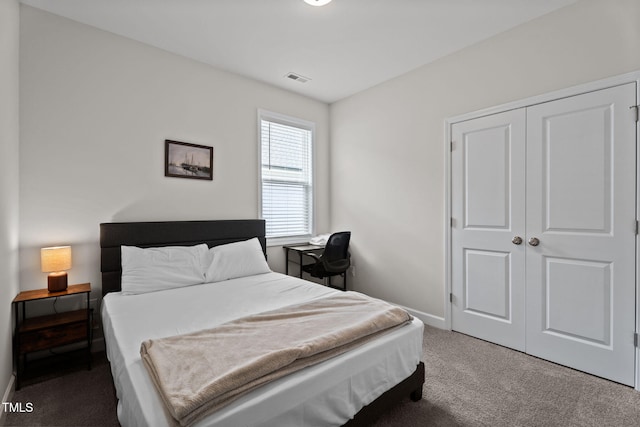 312 E Yukon St, Kenly, NC 27542 - bedroom featuring carpet floors and a closet
