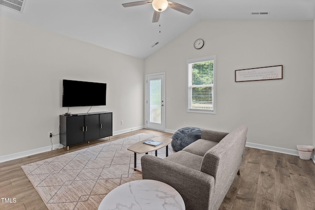 312 E Yukon St, Kenly, NC 27542 - living room with a ceiling fan, wood finished floors, and high vaulted ceiling