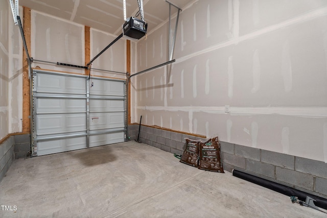 312 E Yukon St, Kenly, NC 27542 - garage featuring a garage door opener
