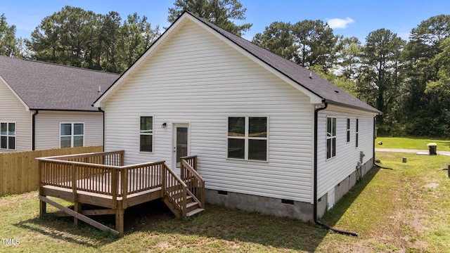 312 E Yukon St, Kenly, NC 27542 - rear view of house with crawl space, a deck, and a shingled roof