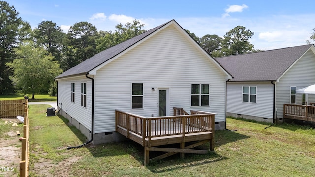 312 E Yukon St, Kenly, NC 27542 - back of house with crawl space, a deck, and a yard