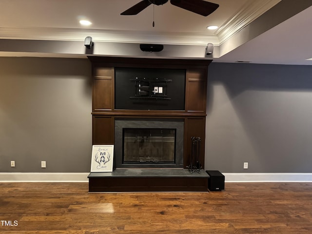2305 Berteau Dr, Wake Forest, NC 27587 - detailed view of crown molding, ceiling fan, a high end fireplace, wood finished floors, and recessed lighting