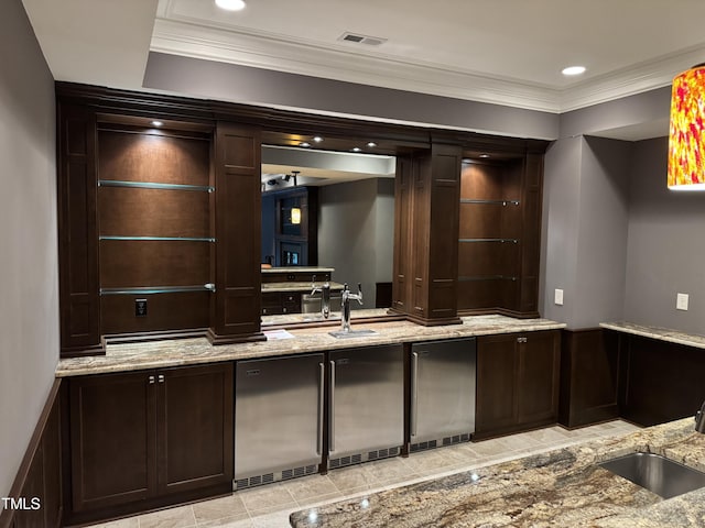 2305 Berteau Dr, Wake Forest, NC 27587 - bar area with ornamental molding, refrigerator, and recessed lighting