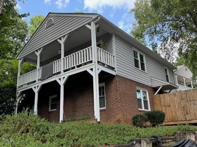 114 Drummond Pl, Cary, NC 27511 - view of home's exterior featuring brick siding