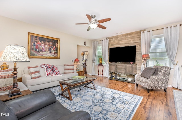 1205 Barnford Mill Rd, Wake Forest, NC 27587 - living room with healthy amount of natural light, ceiling fan, and wood finished floors