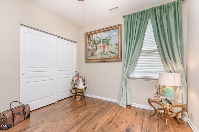 1205 Barnford Mill Rd, Wake Forest, NC 27587 - sitting room featuring wood finished floors and baseboards