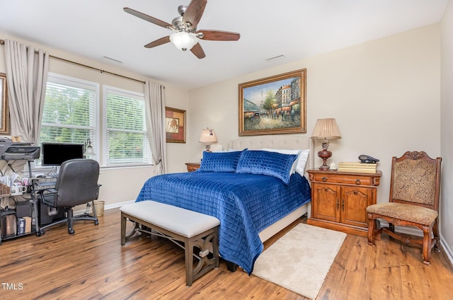 1205 Barnford Mill Rd, Wake Forest, NC 27587 - bedroom featuring light wood-style floors, an office area, and ceiling fan