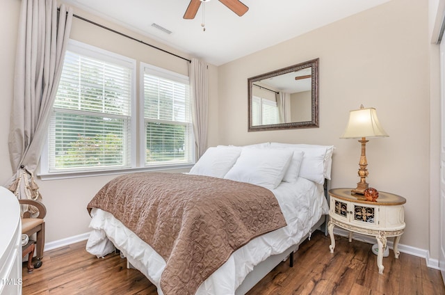 1205 Barnford Mill Rd, Wake Forest, NC 27587 - bedroom with wood finished floors and a ceiling fan