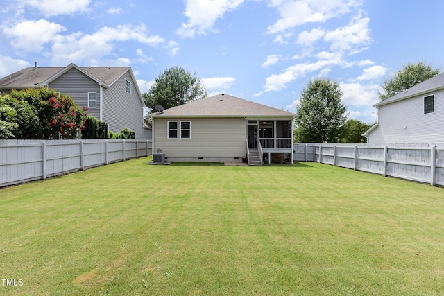 1205 Barnford Mill Rd, Wake Forest, NC 27587 - rear view of house featuring a sunroom and a fenced backyard
