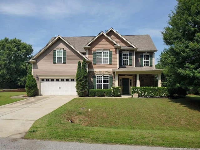 5724 Avera Ln, Holly Springs, NC 27540 - craftsman inspired home featuring a garage, driveway, a front yard, and stone siding