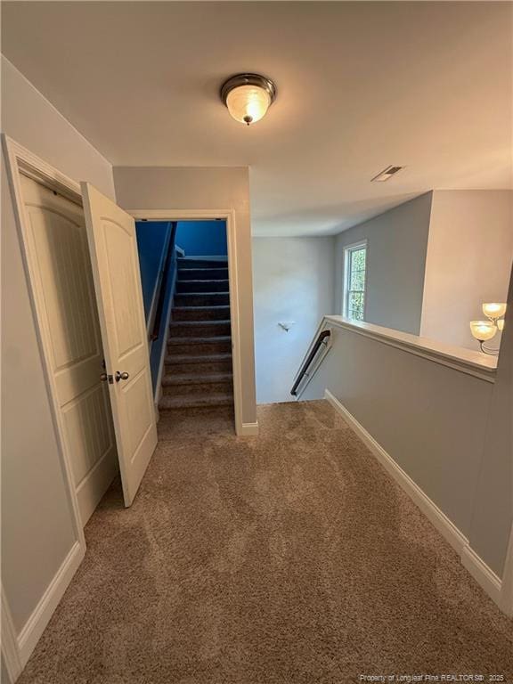 5724 Avera Ln, Holly Springs, NC 27540 - stairs featuring carpet and baseboards