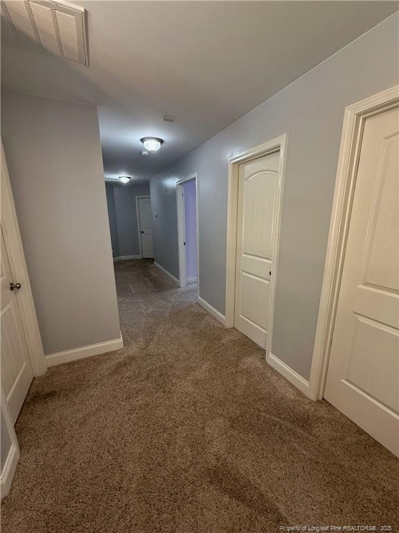 5724 Avera Ln, Holly Springs, NC 27540 - corridor with carpet floors and baseboards
