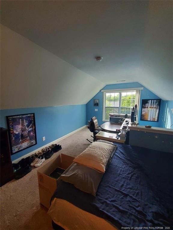 5724 Avera Ln, Holly Springs, NC 27540 - bedroom featuring carpet and lofted ceiling