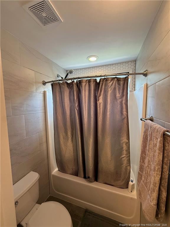 5724 Avera Ln, Holly Springs, NC 27540 - full bath featuring shower / tub combo and tile walls