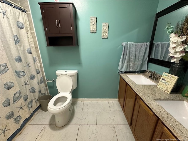 7453 Avila Dr, Fayetteville, NC 28314 - full bath with marble finish floors, double vanity, and a shower with shower curtain