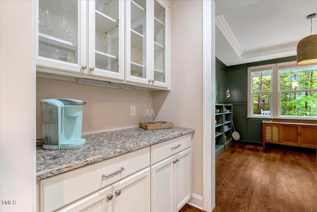 3650 Brooks Bnd, Franklinton, NC 27525 - bar area with crown molding, dark wood-style floors, and hanging light fixtures