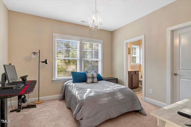 3650 Brooks Bnd, Franklinton, NC 27525 - bedroom with light carpet, a chandelier, and ensuite bath