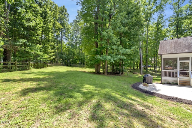 3650 Brooks Bnd, Franklinton, NC 27525 - fenced backyard with a sunroom and a patio