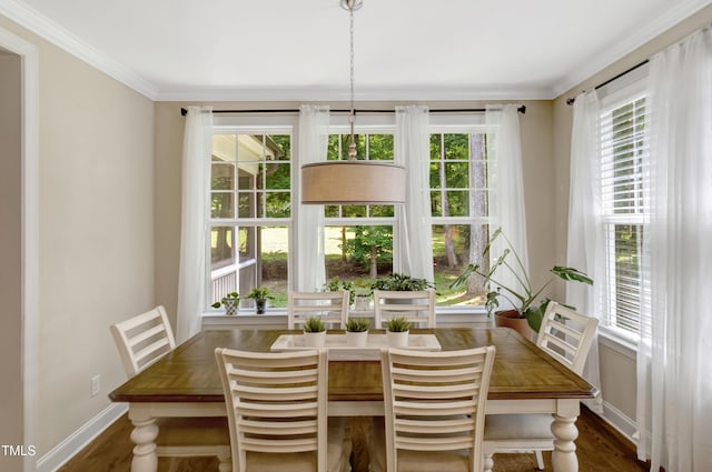 3650 Brooks Bnd, Franklinton, NC 27525 - dining space featuring plenty of natural light, crown molding, and wood finished floors