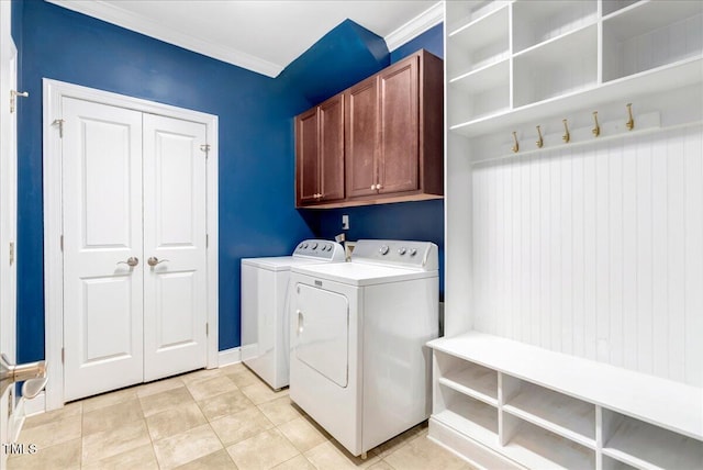 3650 Brooks Bnd, Franklinton, NC 27525 - washroom featuring washer and clothes dryer, cabinet space, crown molding, and light tile patterned floors