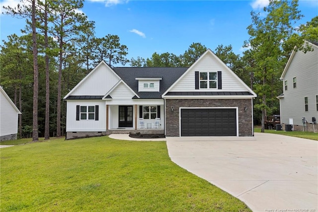 232 Captain Hbr, Sanford, NC 27332 - modern inspired farmhouse featuring concrete driveway, a standing seam roof, a front yard, a metal roof, and a garage