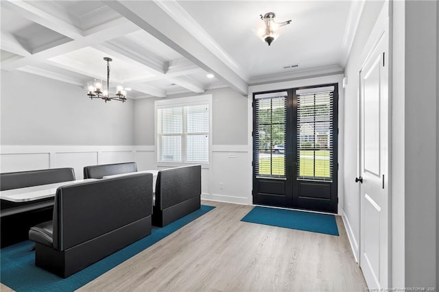 232 Captain Hbr, Sanford, NC 27332 - entryway featuring beamed ceiling, a chandelier, wood finished floors, a wainscoted wall, and french doors