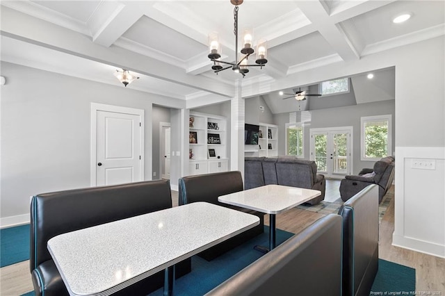232 Captain Hbr, Sanford, NC 27332 - dining space with ceiling fan, a chandelier, coffered ceiling, beam ceiling, and wood finished floors