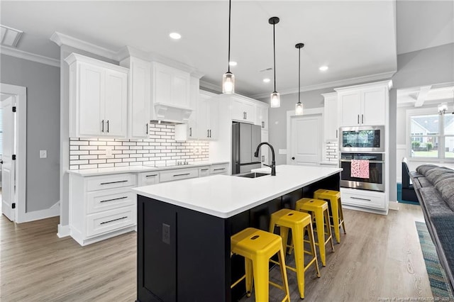 232 Captain Hbr, Sanford, NC 27332 - kitchen featuring appliances with stainless steel finishes, crown molding, decorative backsplash, premium range hood, and light countertops