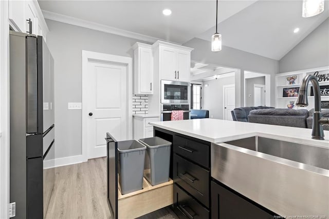 232 Captain Hbr, Sanford, NC 27332 - kitchen featuring stainless steel appliances, white cabinetry, light wood-style floors, light countertops, and recessed lighting