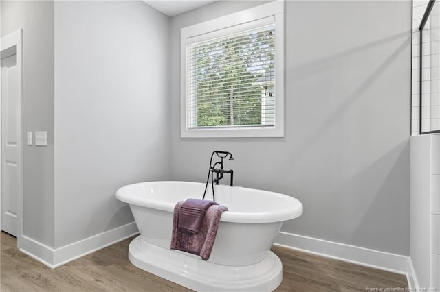 232 Captain Hbr, Sanford, NC 27332 - full bath featuring wood finished floors and a freestanding tub