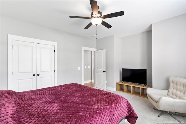 232 Captain Hbr, Sanford, NC 27332 - bedroom featuring carpet, a closet, and a ceiling fan