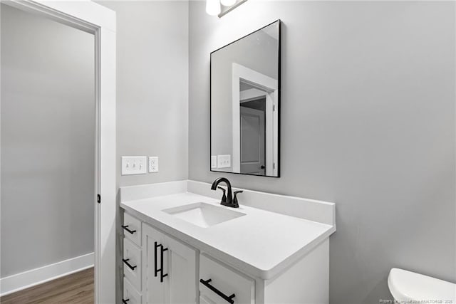 232 Captain Hbr, Sanford, NC 27332 - half bathroom featuring vanity and wood finished floors