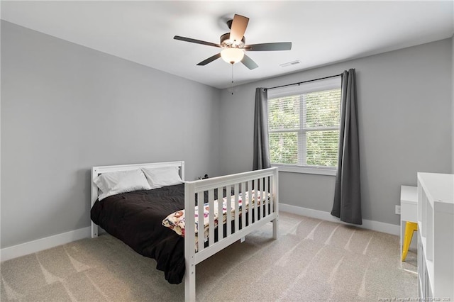 232 Captain Hbr, Sanford, NC 27332 - carpeted bedroom with baseboards and a ceiling fan