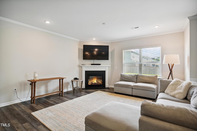4805 Ozark St, Fuquay Varina, NC 27526 - living area featuring crown molding, dark wood finished floors, a fireplace with flush hearth, and recessed lighting