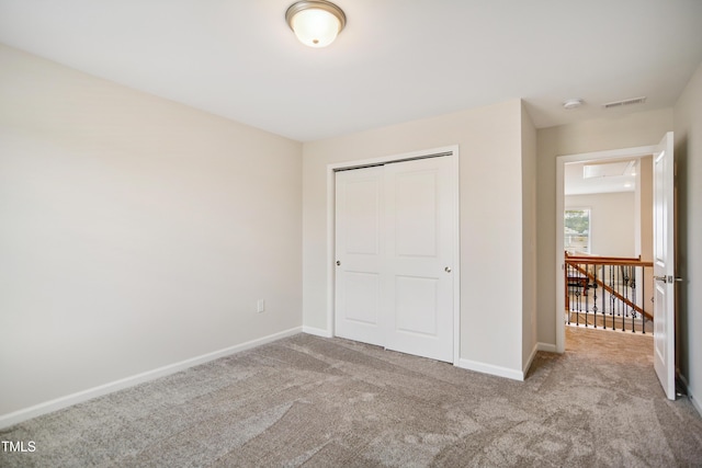4805 Ozark St, Fuquay Varina, NC 27526 - unfurnished bedroom with carpet floors and a closet