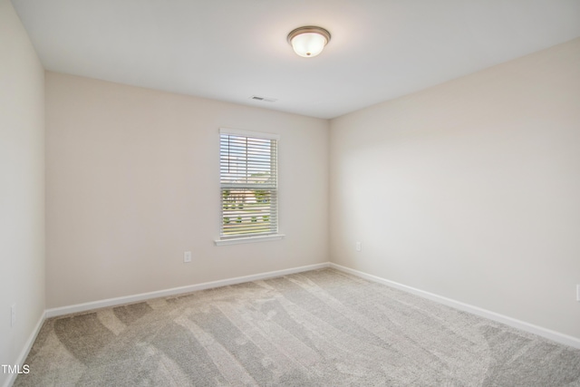 4805 Ozark St, Fuquay Varina, NC 27526 - carpeted empty room featuring baseboards