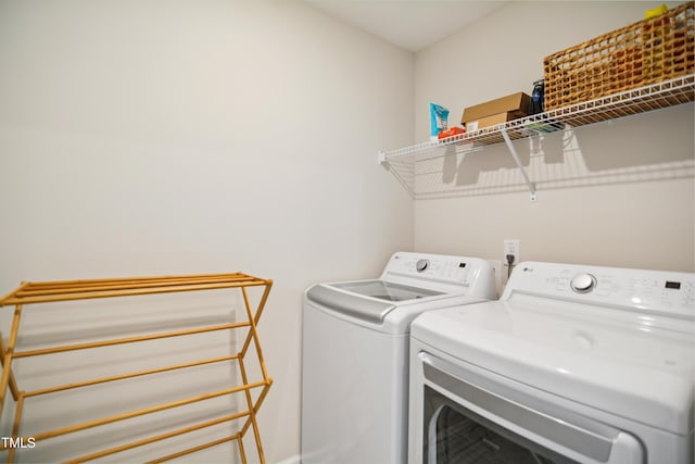 4805 Ozark St, Fuquay Varina, NC 27526 - laundry area featuring washer and dryer and baseboards