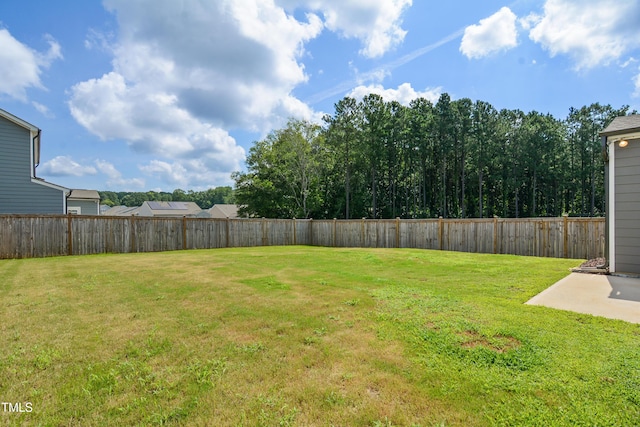 4805 Ozark St, Fuquay Varina, NC 27526 - fenced backyard featuring a patio area