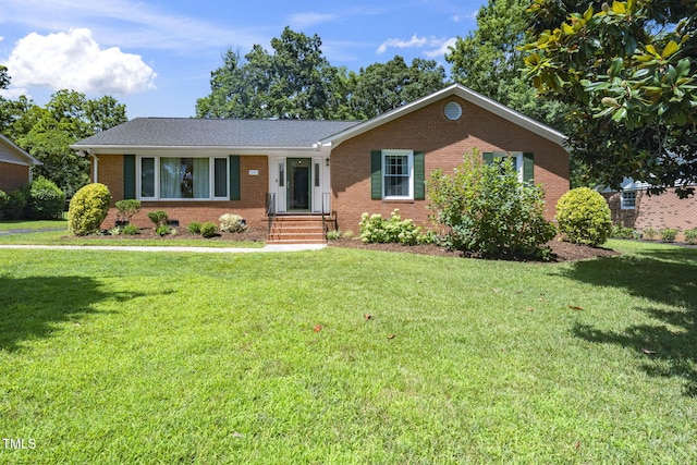 5203 Shady Bluff St, Durham, NC 27704 - ranch-style home featuring brick siding and a front yard
