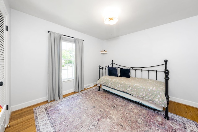 5203 Shady Bluff St, Durham, NC 27704 - bedroom featuring wood finished floors