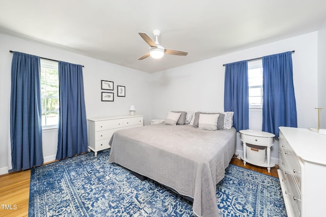 5203 Shady Bluff St, Durham, NC 27704 - bedroom with light wood-type flooring and ceiling fan