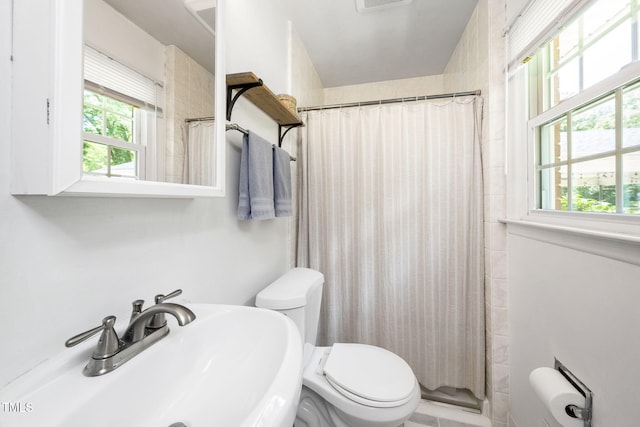 5203 Shady Bluff St, Durham, NC 27704 - full bath featuring curtained shower