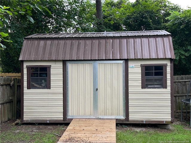 6622 Vaughn Rd, Fayetteville, NC 28304 - view of shed featuring a fenced backyard