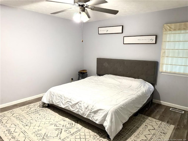 6622 Vaughn Rd, Fayetteville, NC 28304 - bedroom with wood finished floors and ceiling fan