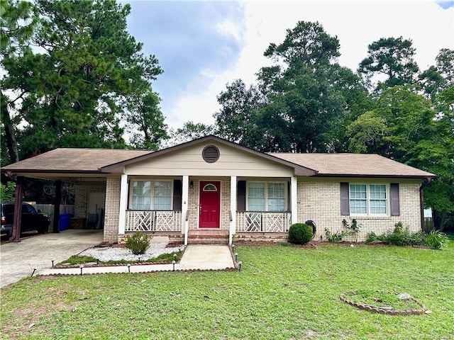 6622 Vaughn Rd, Fayetteville, NC 28304 - ranch-style home with a carport, brick siding, covered porch, and driveway
